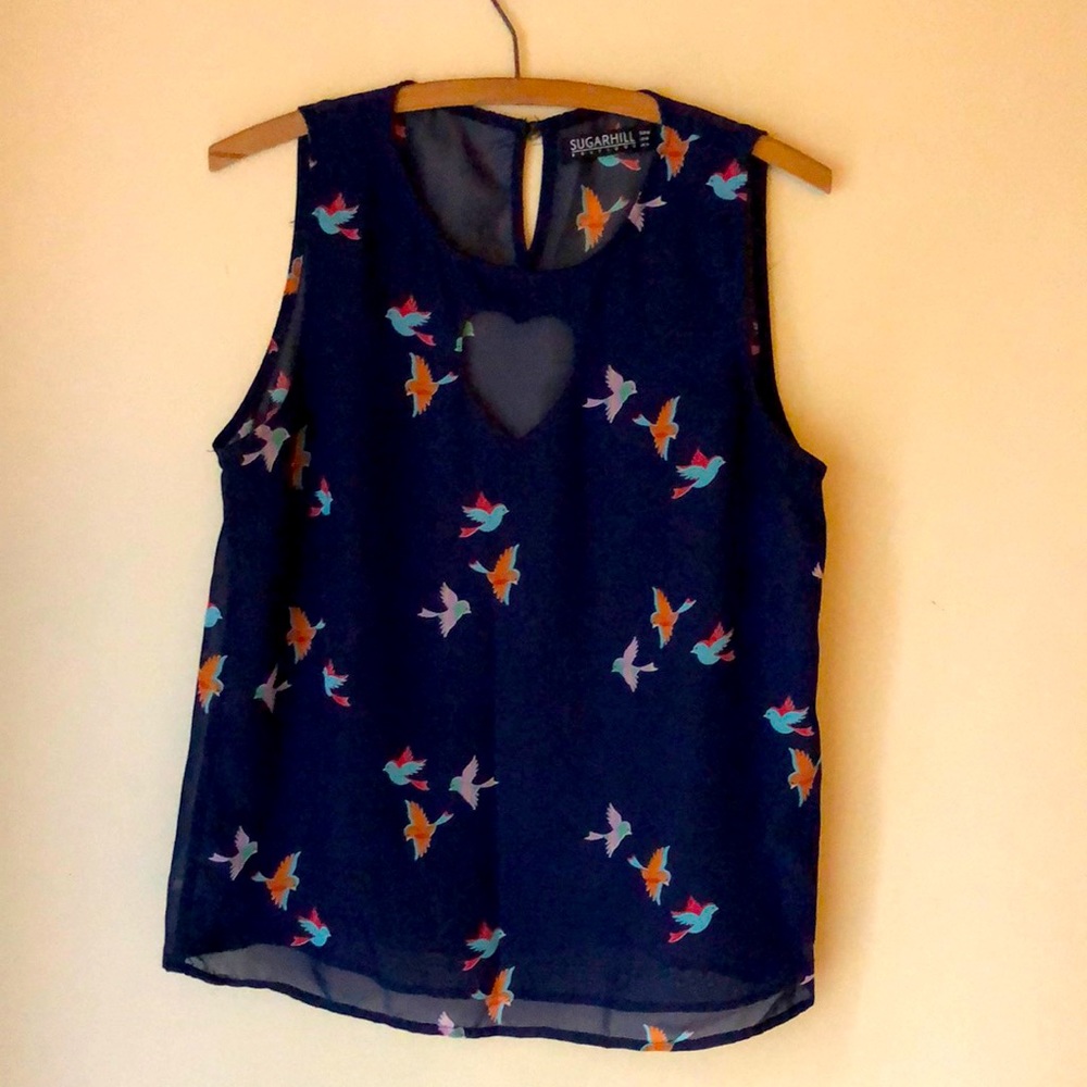 Sleeveless blouse, size M, with sheer back